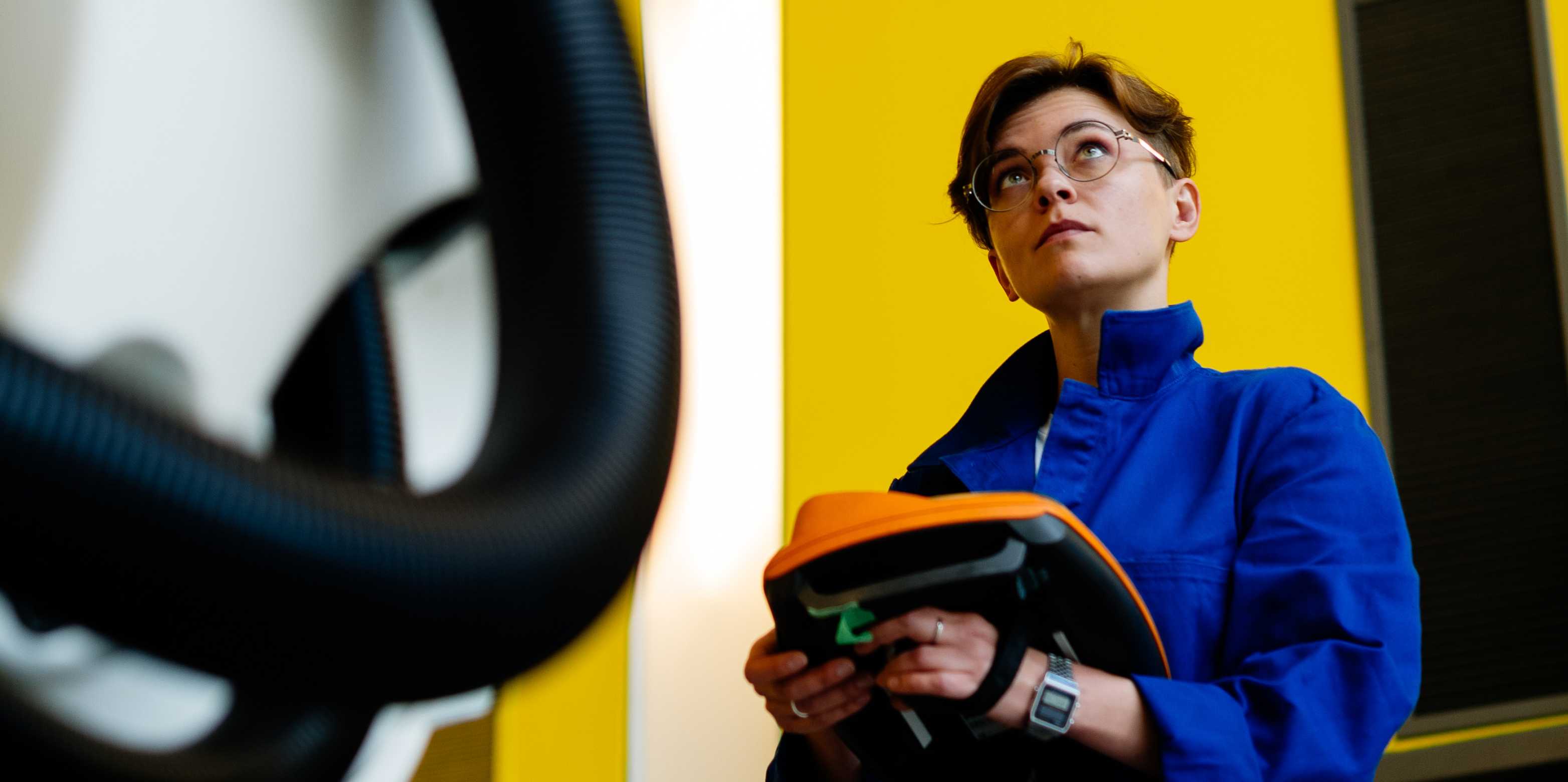 Prof. Maria Yablonina, inside a robotics laboratory.